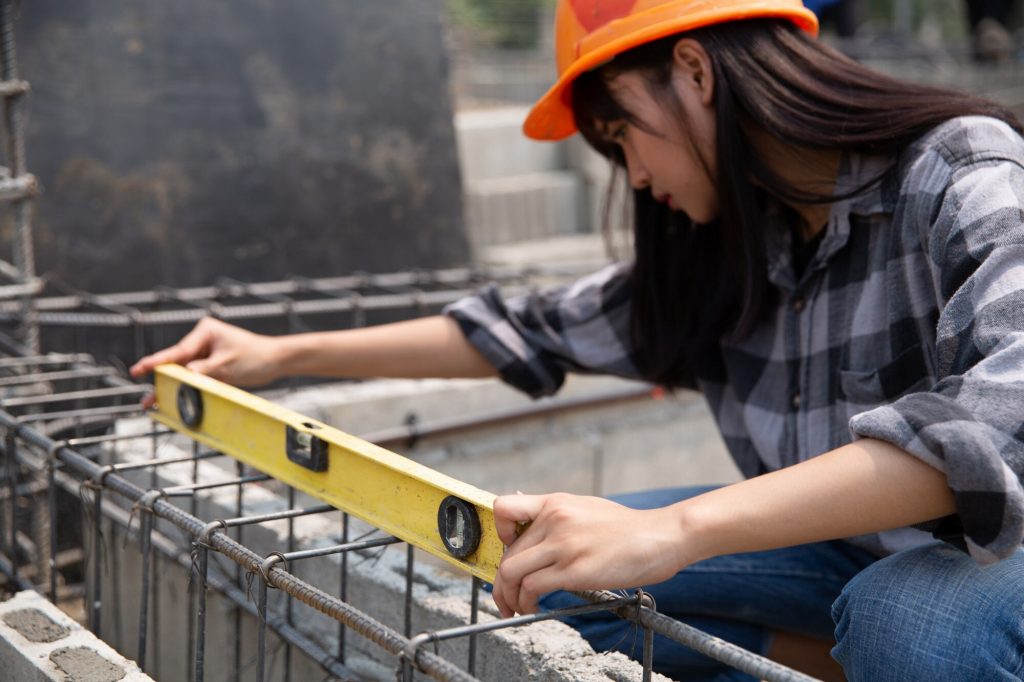 Close up of a woman construction worker in construction site